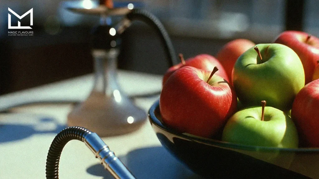 green and red apples in the bowl next to a hookah 