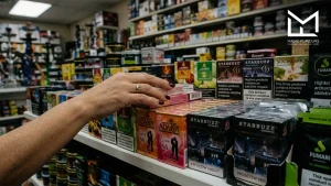Shisha flavor boxes including Love 66 and Moscow Nights on a store shelf